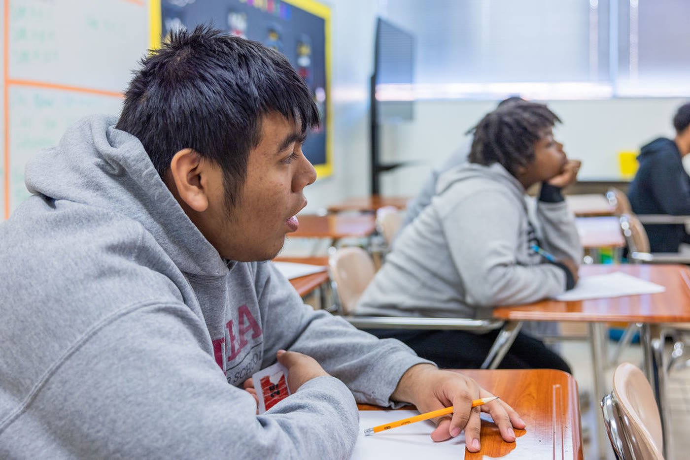 Students working at their desks in class